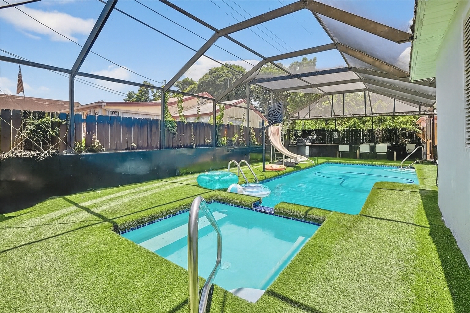Screened pool and spa with patio